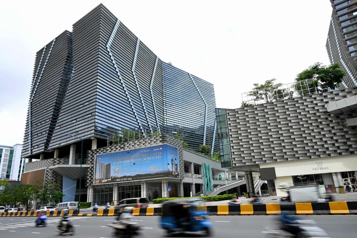 A view of the Prince International Plaza in Phnom Penh, owned by UK-Cambodian businessman Chen Zhi, who is facing an indictment in the US and UK for allegedly running forced labor camps in Cambodia where trafficked workers carried out cryptocurrency fraud schemes that netted billions of dollars. (AFP)