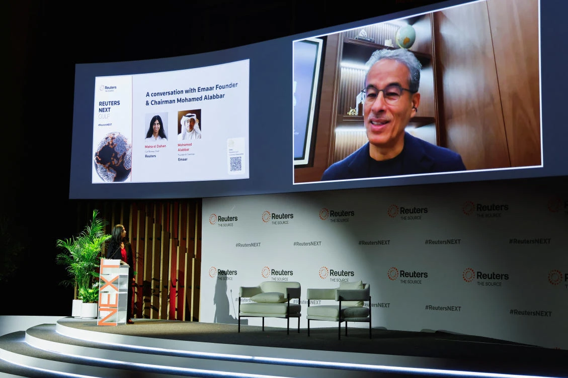 Emaar Founder and Chairman Mohamed Alabbar appears on-screen as he speaks at the Reuters NEXT Gulf Summit in Abu Dhabi. (Reuters)