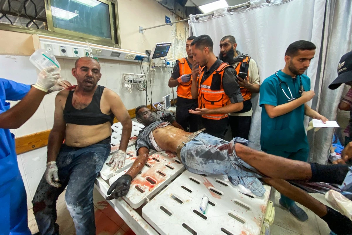 Palestinian medics evacuate a casualty of Israeli strikes on Nasser hospital in Khan Yunis in the southern Gaza Strip on August 25, 2025, with reports stating several killed including journalists. (File/AFP)