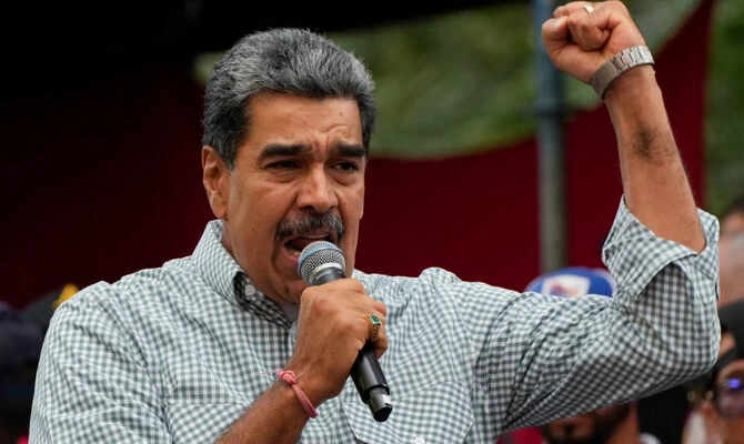 Venezuela’s President Nicolás Maduro said the United States government is forging a war against him as the world's biggest warship approaches the South American country. (AP/File)
