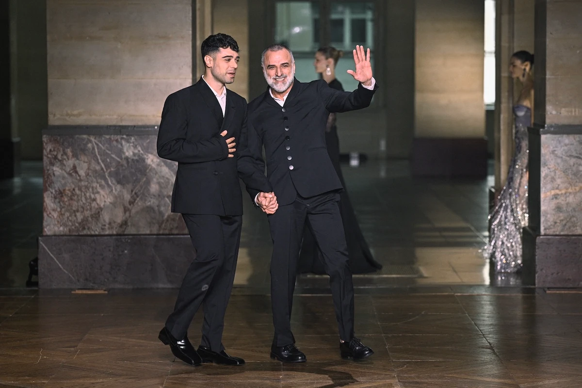 Georges Hobeika (R) is the founder of the label, while his son, Jad Hobeika (L), serves as its co-creative director. AFP