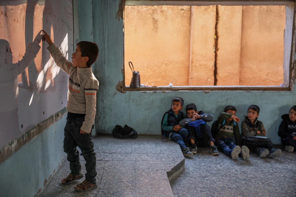 Across Syria, 4 million students are currently enrolled in school, Annan said, while roughly 2.5 to 3 million children remain out of school. (AP)