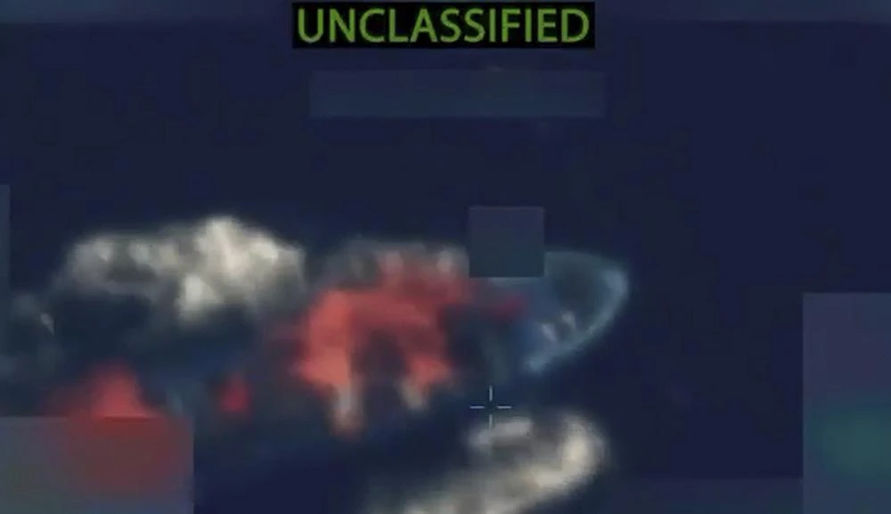 Above, one four alleged drug-smuggling boats in the eastern Pacific Ocean that was destroyed by US strikes. (X: @PeteHegseth/AFP)