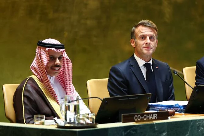 Saudi Arabia's Foreign Minister Faisal bin Farhan and France's President Emmanuel Macron at the two-state summit. (AFP/File)
