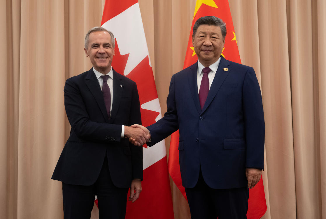 Canadian Prime Minister Mark Carney, left, shakes hands with Chinese President Xi Jinping at the start of a meeting in Gyeongju, China on Oct. 31, 2025. (The Canadian Press via AP)