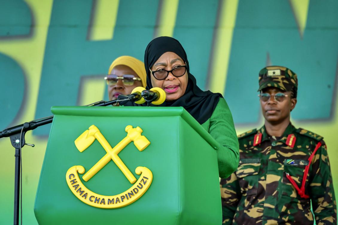 Tanzania’s ruling party Chama Cha Mapinduzi (CCM) presidential candidate and incumbent President Samia Suluhu Hassan delivers her remarks during the party's closing campaign rally in Mwanza on October 28, 2025. (Photo by Michael JAMSON / AFP)