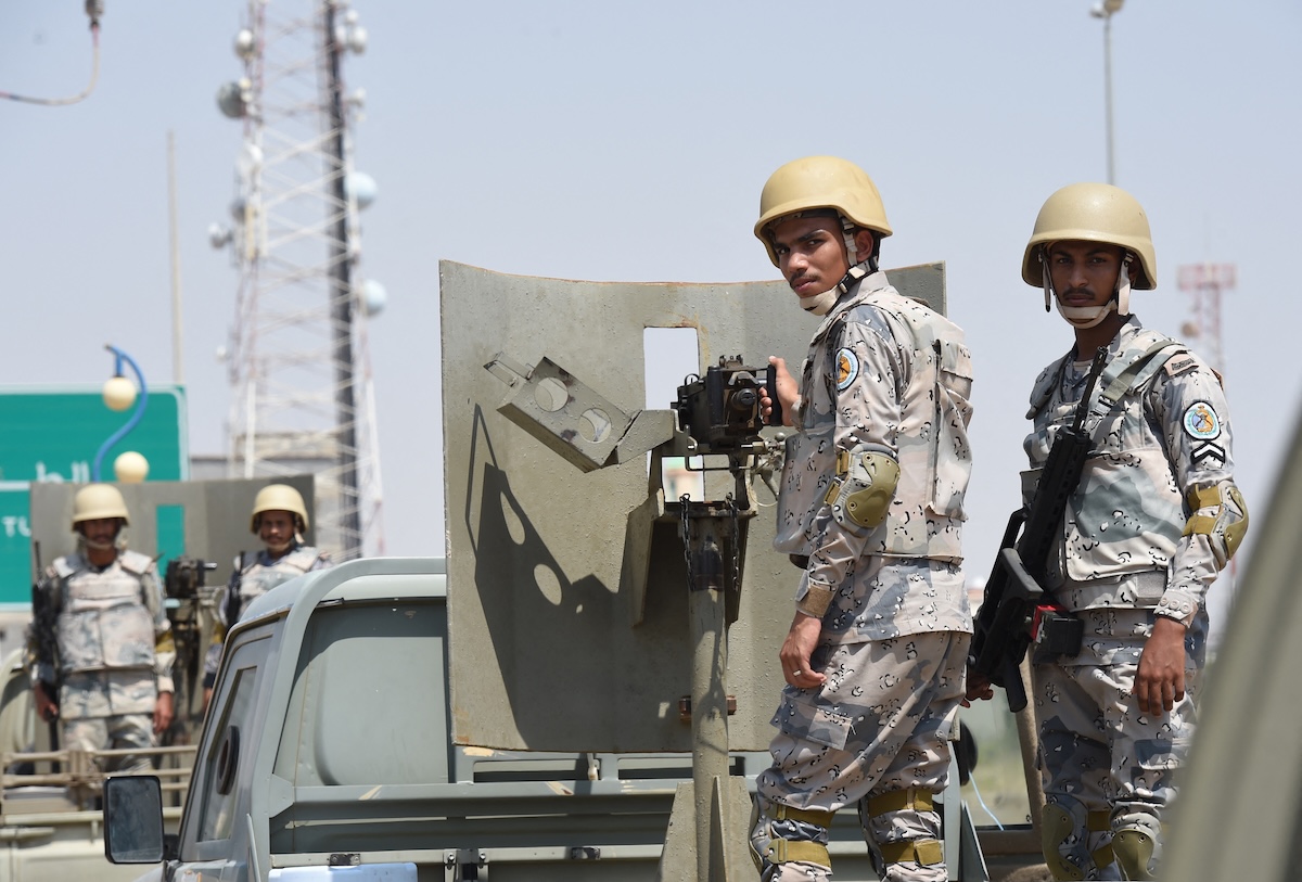 Saudi border guards stand guard in the closed al-Tuwal border crossing with Yemen in the southern Jizan province on October 3, 2017. (FILE/AFP)