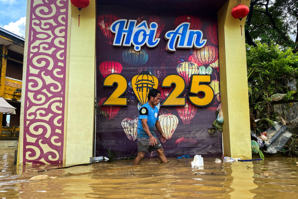 The historic floods last week submerged Hoi An’s lantern-lit streets and centuries-old wooden houses, forcing hundreds of businesses to temporarily close. (Reuters)