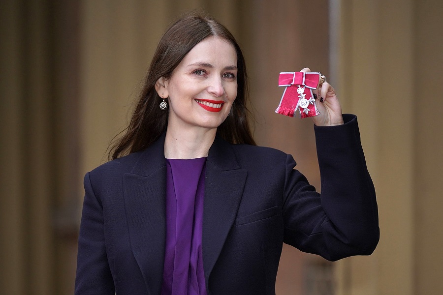 Roksanda Ilincic poses with their medal after being appointed a Member of the Order of the British Empire (MBE) following an investiture ceremony at Buckingham Palace, on January 31, 2024. (AFP)