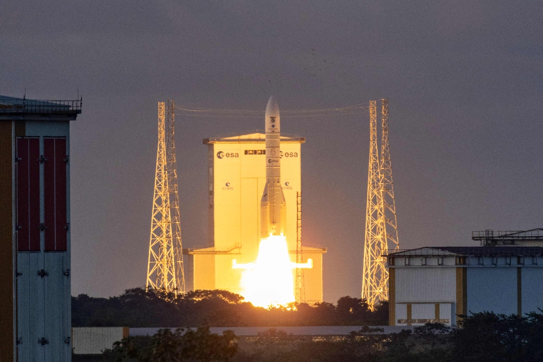 This photograph shows the European Space Agency (ESA) Ariane 6 rocket carrying the Sentinel 1-D earth observation satellite by European Space Agency (ESA) blasts off at the Guiana Space Centre in Kourou, on the French overseas department of Guiana. (AFP)