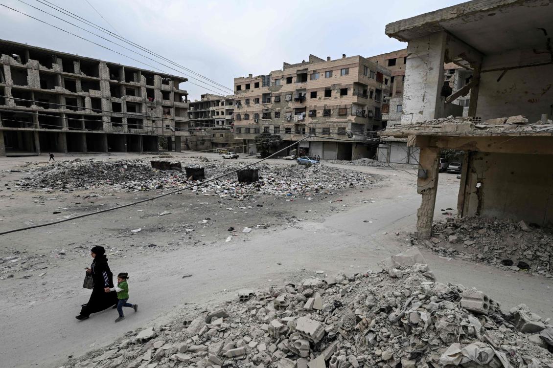 War-damaged buildings in the eastern outskirts of Damascus. Syria has been pushing for the international community to remove all sanctions to help the country rebuild. (AFP)