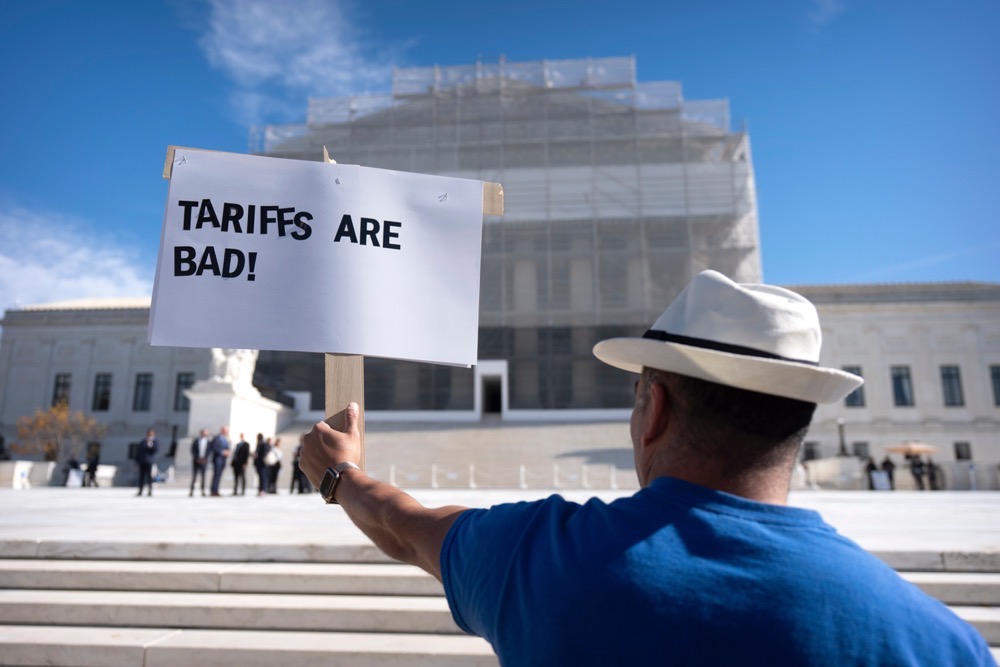 A demonstrator protests outside the Supreme Court on Wednesday, Nov. 5, 2025, in Washington. (AP)