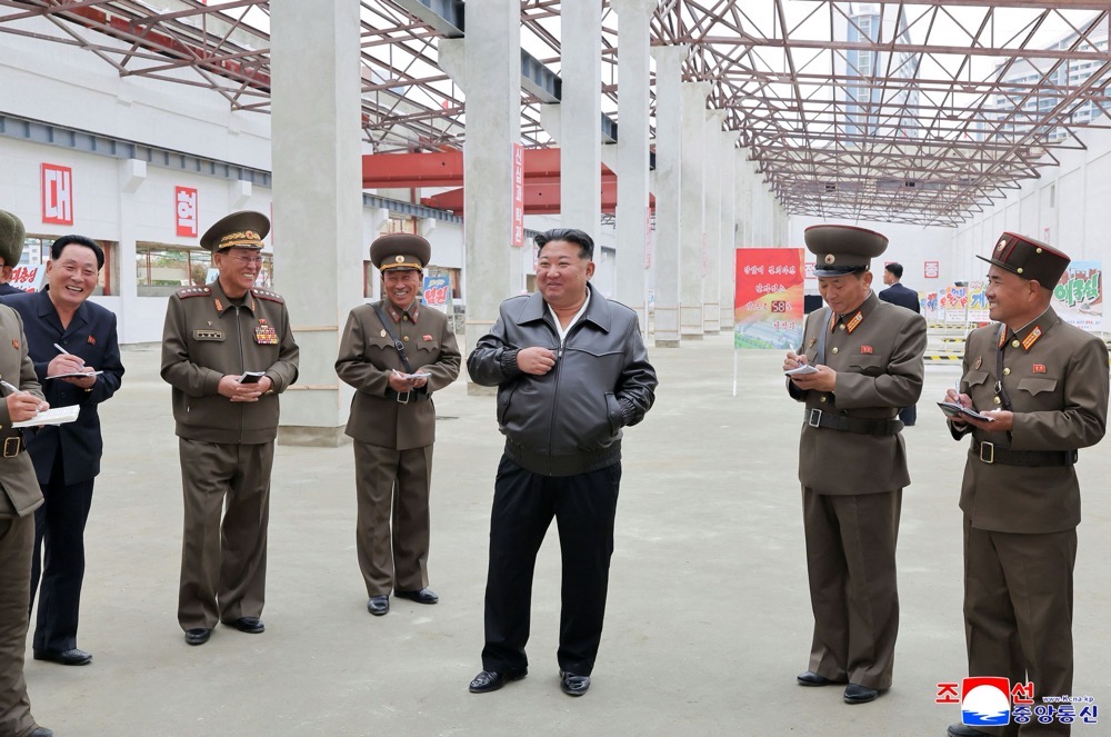 North Korean leader Kim Jong Un inspecting the construction sites of a school fixtures factory in Pyongyang. (KCNA VIA KNS/AFP)