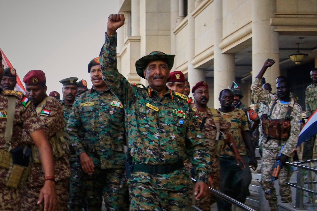 Sudan's military chief Gen. Abdel-Fattah Burhan is greeted by troops as he arrives at the Republican Palace, recently recaptured from the Rapid Support Forces (RSF) paramilitary group, in Khartoum, Sudan. (AP)