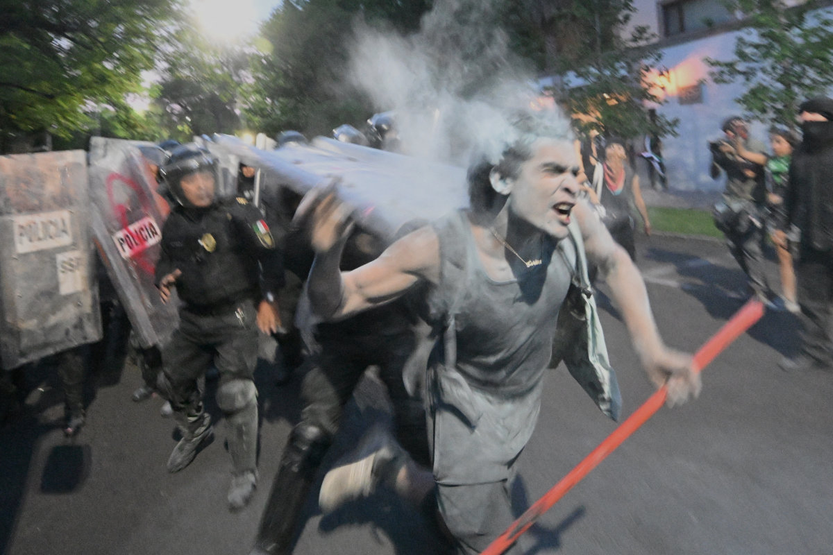 Demonstrators clash with the police during a pro-Palestinian rally in front of the Israeli embassy in Mexico City on May 28, 2024. (AFP file)