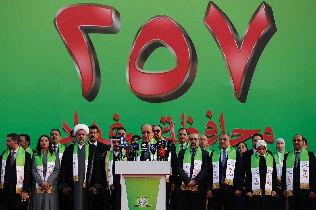 Former Iraqi prime minister Nuri al-Maliki delivers a speech during a campaign rally for the State of Law Coalition ahead of the country's parliamentary elections in Baghdad. (AP)