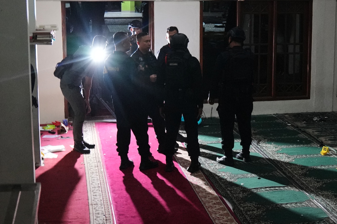 Members of Indonesian Police bomb squad inspect the mosque where explosions went off at a high school compound in Jakarta, Indonesia. (AP)