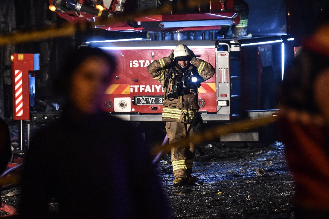 Firemen intervene and search for injured patients after a fire broke out at the hospital building in the Gaziosmanpasa district of Istanbul in 2018. (AFP)
