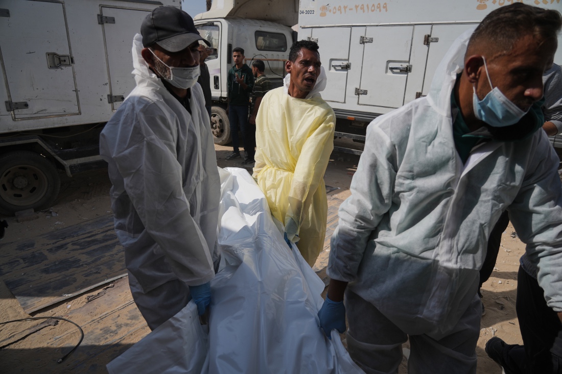 Bodies of unidentified Palestinians returned from Israel as part of the ceasefire deal are brought to Nasser Hospital in Khan Younis, Gaza Strip. (AP)