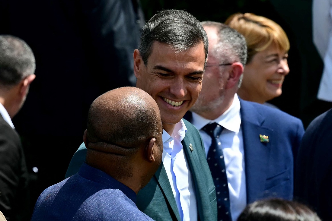 Spain's Prime Minister Pedro Sanchez leaves after the family photo at the Leaders Summit ahead of the COP30 UN climate conference in Belem, Para State, Brazil. (AFP)