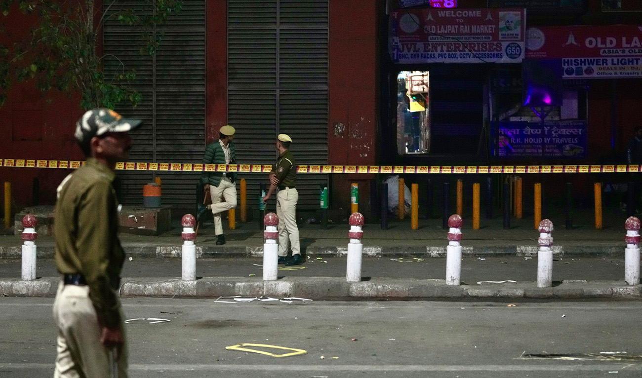 Policemen guard the site after a car explosion near the historic Red Fort in New Delhi, India, Monday, Nov. 10, 2025. (AP)