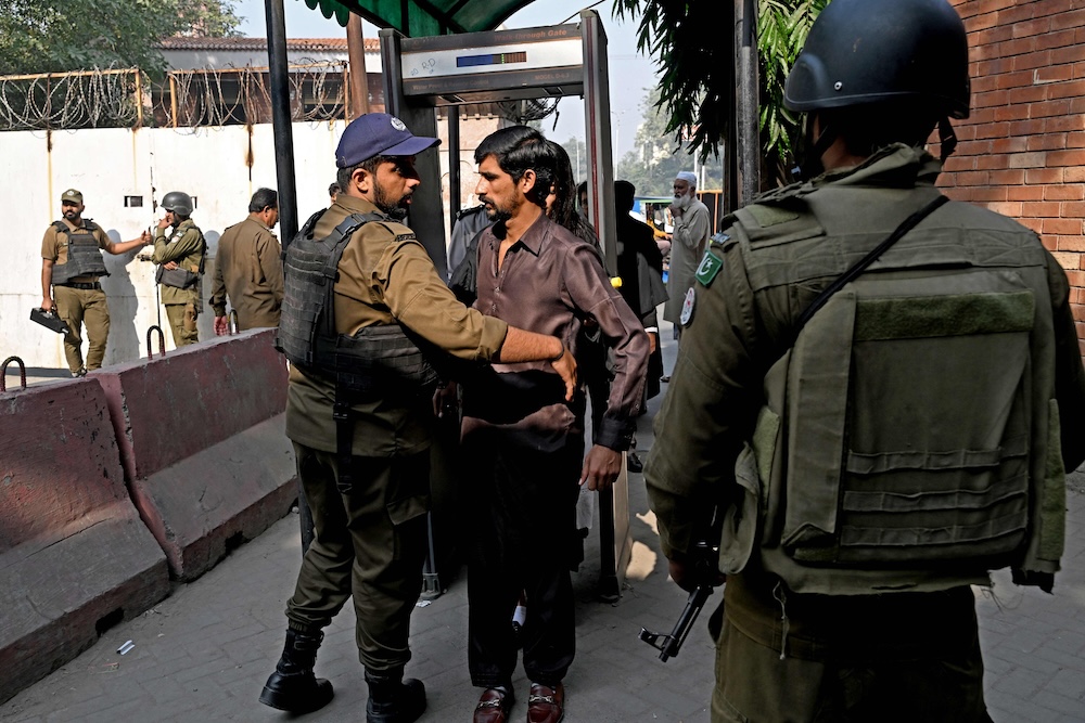 Residents in the Pakistani capital Islamabad were facing tightened security checks on Wednesday in the wake of a suicide bombing. (AFP)