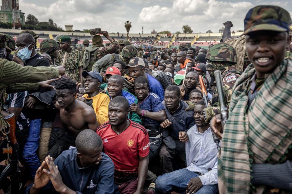 Police and soldiers attempt to control supporters and mourners at Nyayo Stadium, where the body of Kenya’s opposition leader and former PM Raila Odinga lies in state, Nairobi, Oct. 17, 2025. (AFP)