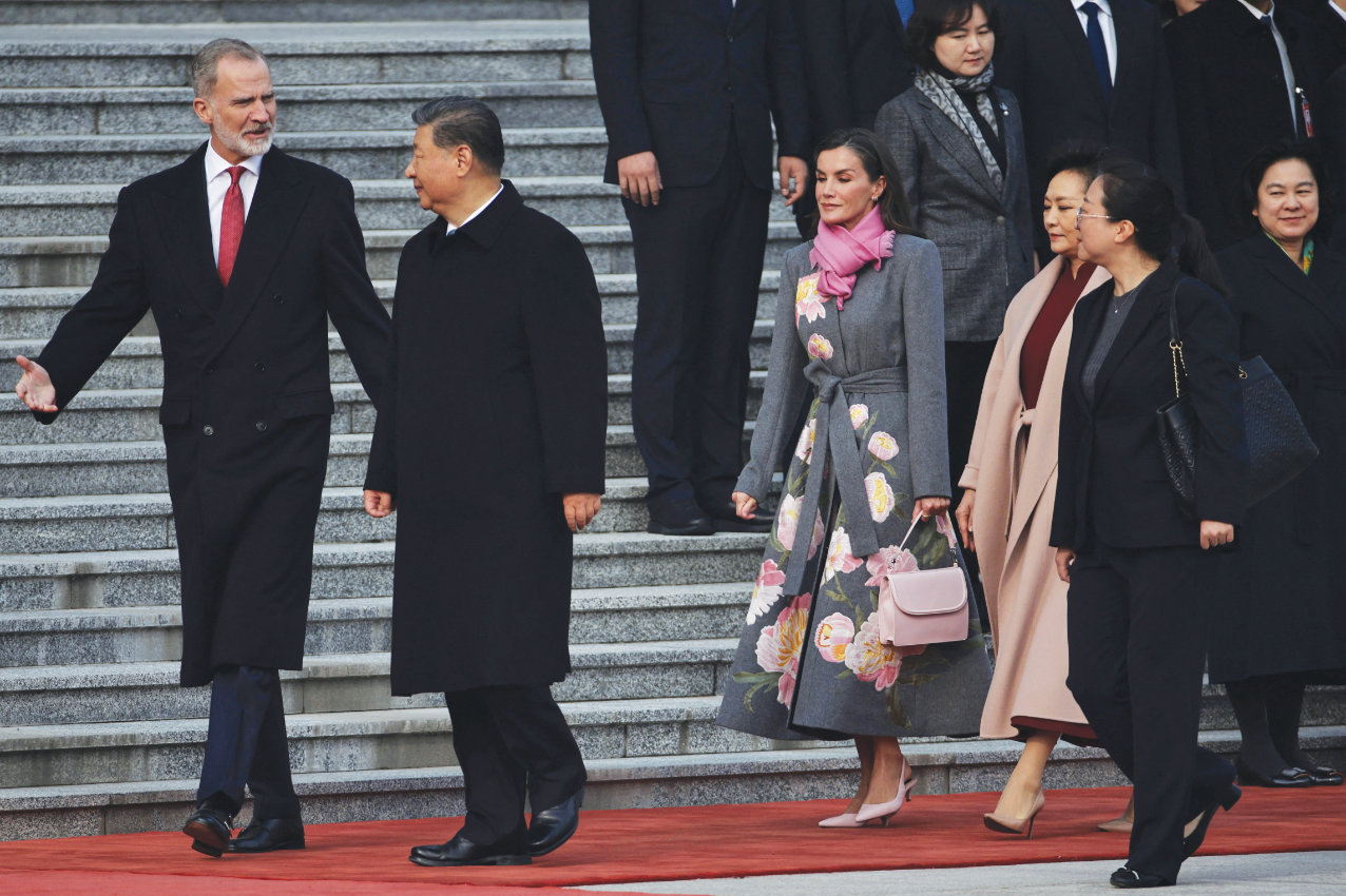 Spain’s King Felipe VI and Queen Letizia arrive for the welcome ceremony hosted by Chinese President Xi Jinping and his wife Peng Liyuan at the Great Hall of People in Beijing, China, on Tuesday. (Reuters)
