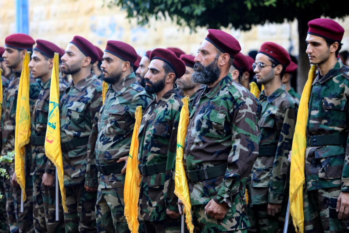 Hezbollah fighters take part in the funeral procession of the movement's commanders Ibrahim Mohammed Kobeissi and Hussein Ezzedine, killed a day earlier in an Israeli strike on Beirut's southern suburbs, on September 25, 2024. (File/AFP)