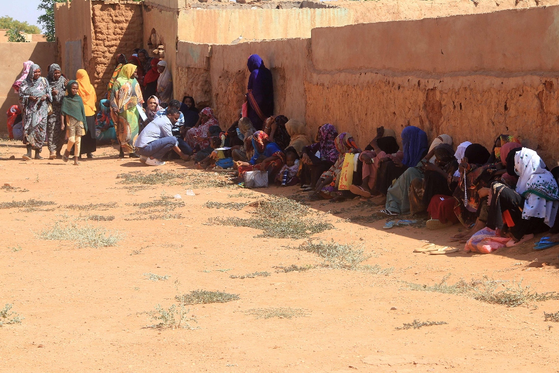 Displaced people from the towns of Bara and Umm Dam Haj Ahmed in North Kordofan State take shelter in Omdurman, part of greater Khartoum. (AFP)