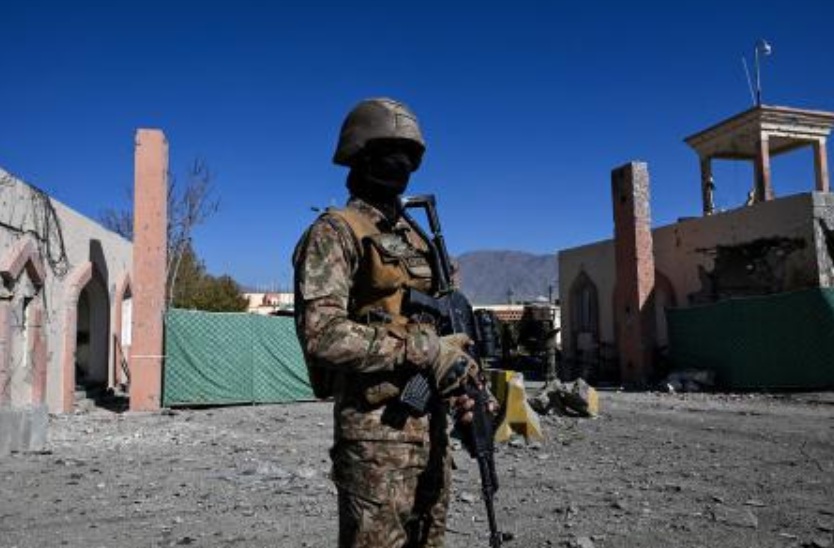 A Pakistani military troop guards outside the damaged entrance after an attack on the Cadet College Wana, a military-linked school, in the South Waziristan district near the Pakistan-Afghanistan border, on Nov. 13, 2025. (AFP)