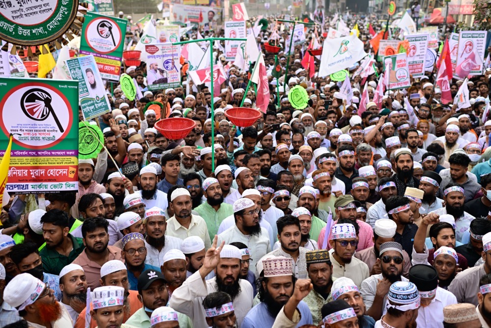 Supporters of Bangladesh's Jamaat-e-Islami and seven allied political parties shout slogans during a rally to present their demands before the next general election. (AP)