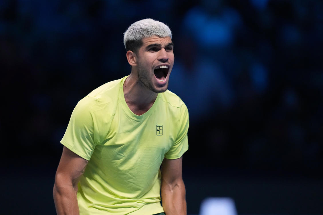 Spain’s Carlos Alcaraz celebrates after winning against Italy’s Lorenzo Musetti during the tennis match of the ATP World Tour Finals, in Turin, Nov. 13, 2025. (AP)