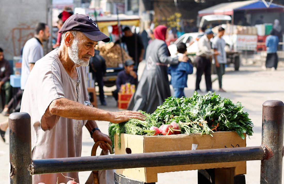 A Palestinian man shops at a market in Nuseirat, central Gaza Strip. (Reuters)