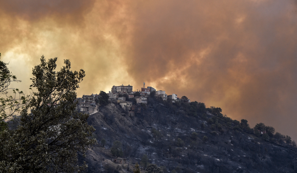 Smoke rises from a wildfire in the forested hills of the Kabylie region, east of the capital Algiers, on August 10, 2021. (AFP file photo)