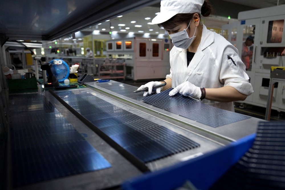 Chinese firms have helped fill the gap in Myanmar’s power infrastructure, supplying cheap solar panels. Above, a production line for solar panels at a factory of GCL System Integration Technology in Hefei, Anhui province, China. (China Daily via Reuters)