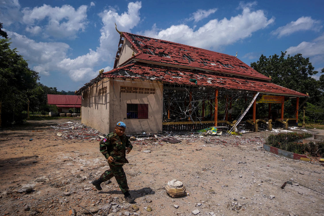 A Cambodian soldier walks past a building, damaged by an artillery, during a visit of delegation of foreign diplomats to inspect a damaged area along the Thailand-Cambodia’s border in Oddar Meanchey, Cambodia on Aug. 1, 2025. (Reuters)