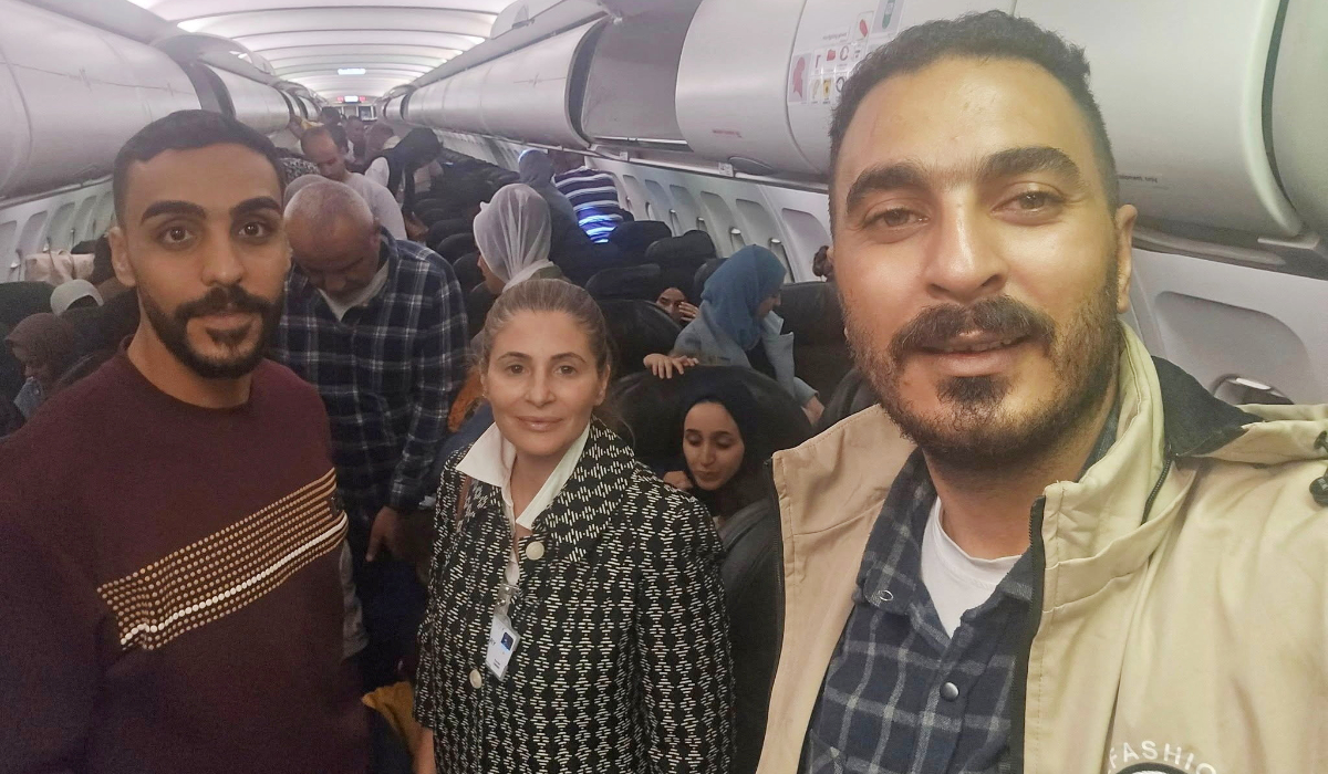 Hanan Jarrar, Palestinian ambassador to South Africa, smiles for a picture on a plane in a location given as given as Johannesburg, South Africa, in this handout image released on November 13, 2025. (REUTERS)