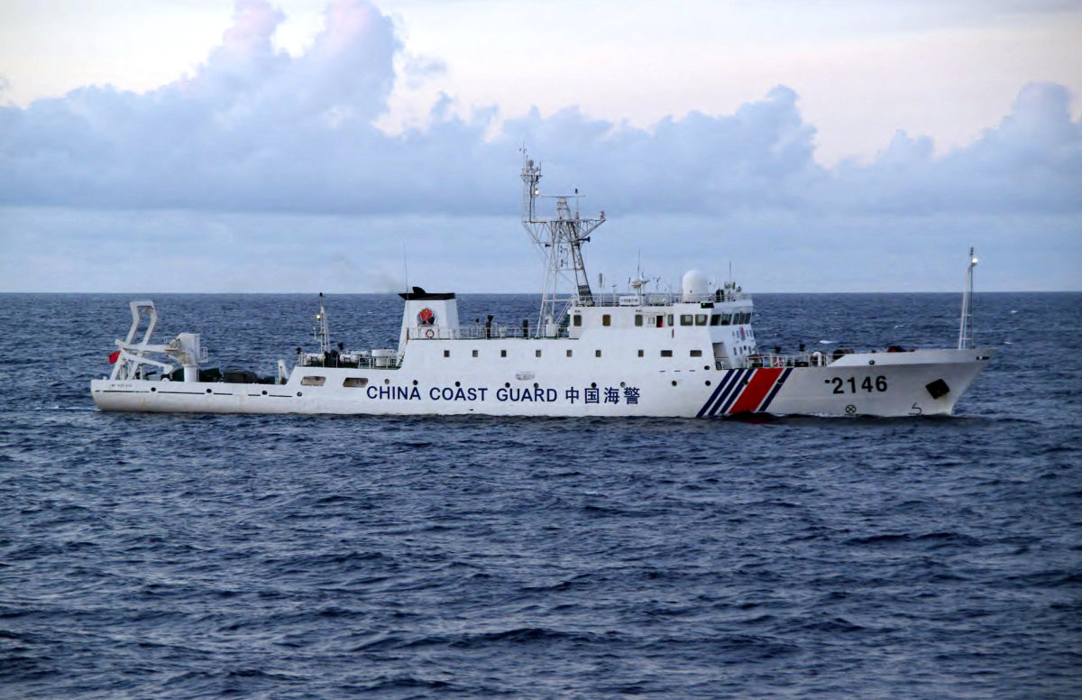 This handout picture taken and released by the Japan Coast Guard on August 8, 2013 shows a Chinese Coast Guard ship cruising near the disputed islets known as the Senkaku islands in Japan and Diaoyu islands in China, in the East China Sea. (AFP file photo)