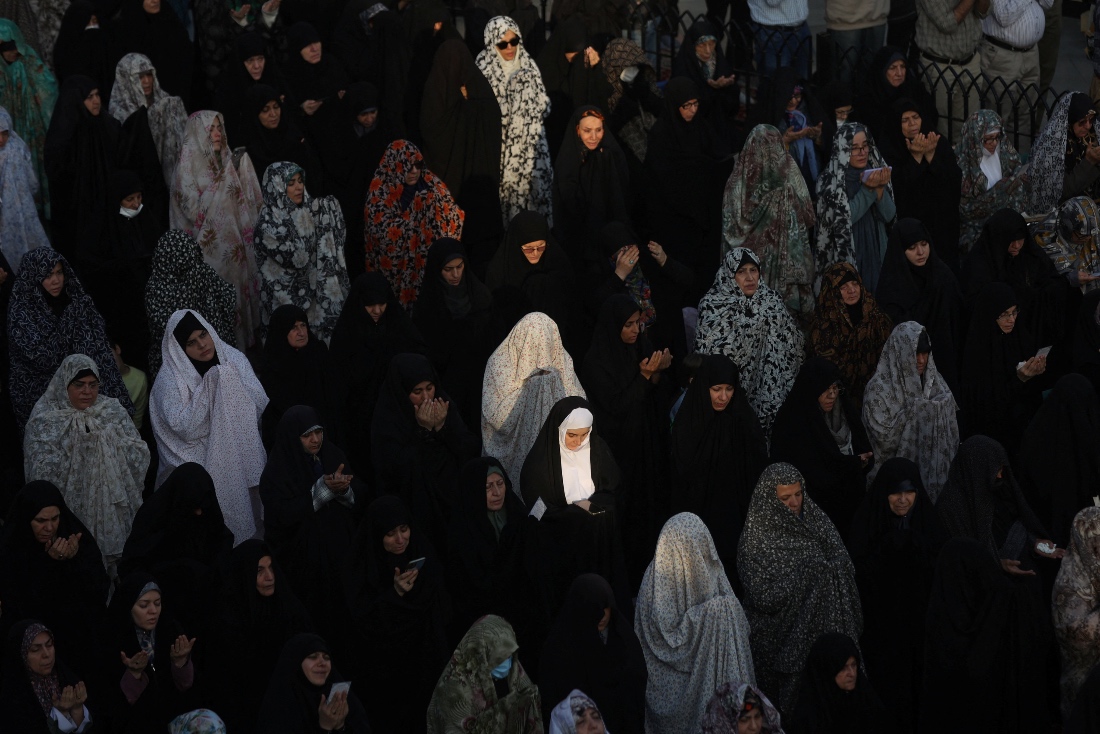 Iranian women pray for rain following a drought crisis at Imamzadeh Saleh shrine in Tehran, Iran. (WANA)