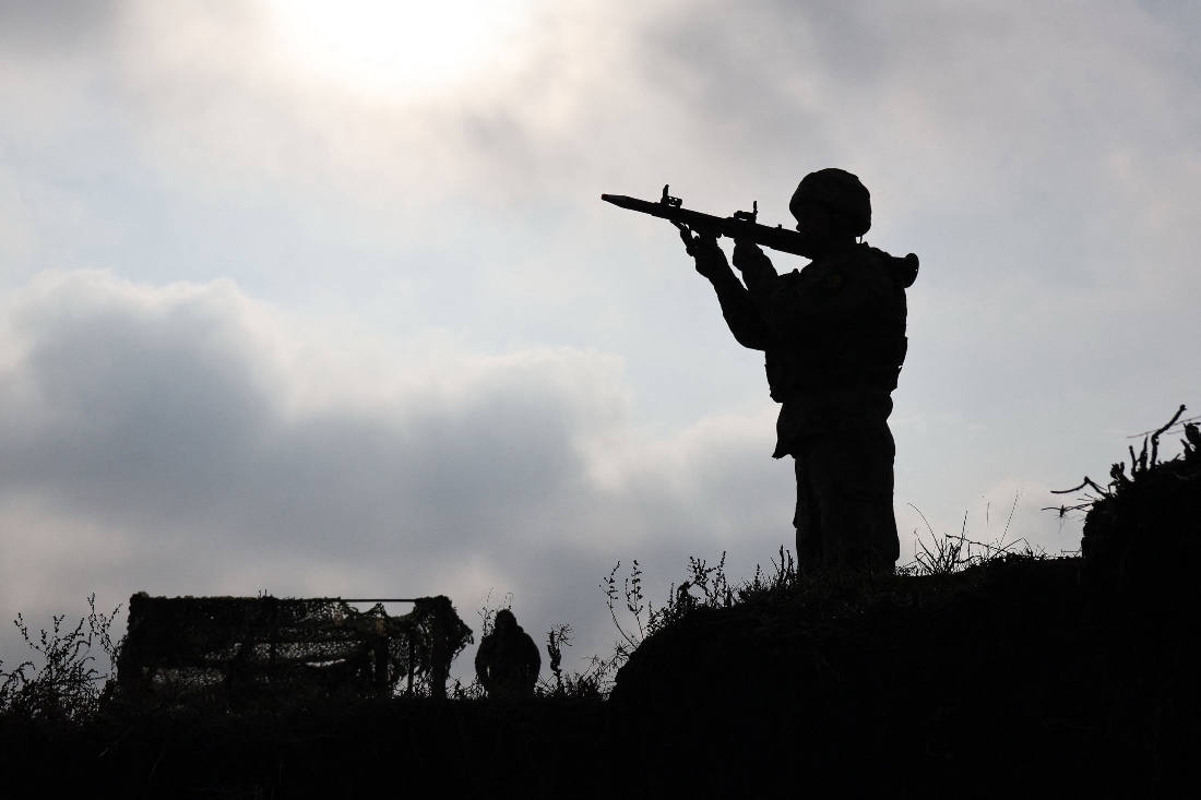 Ukrainian recruit learns how to fire a RPG-7 grenade launcher at an undisclosed location, amid the Russian invasion of Ukraine. (AFP)