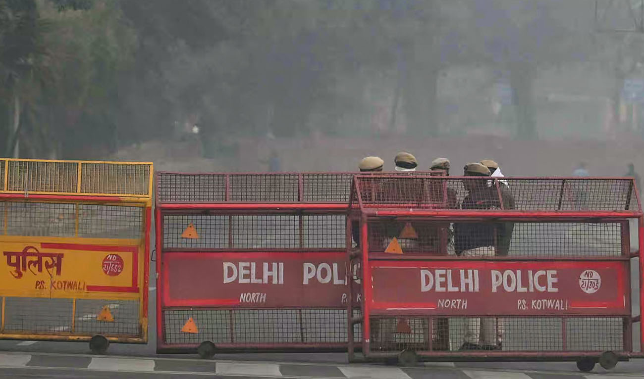 Security personnel are seen at the blast site following an explosion near the Red Fort in the old quarters of Delhi on November 11, 2025. (AFP)