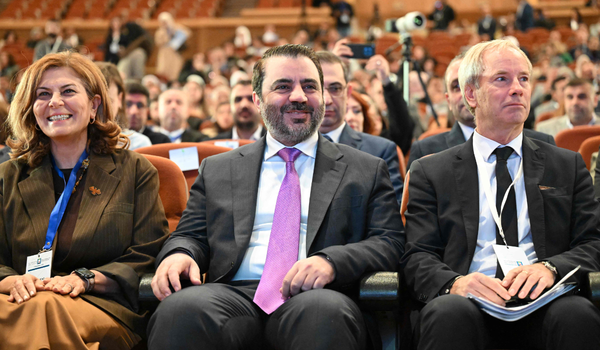 Syrian Minister of Social Affairs and Labour Hind Kabawat (L), Syrian Minister of Foreign Affairs and Expatriates Asaad Al-Shaibani (C) and Deputy Secretary-General of the European External Action Service Olof Skoog (R) react during a day of dialogue with Syrian civil society at Conference Palace near Damascus on November 15, 2025. (AFP)