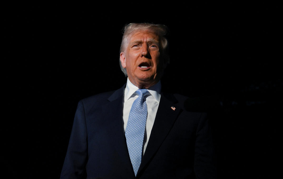 US President Donald Trump speaks to the media as he boards Air Force One en route to Washington, at Palm Beach International Airport, in West Palm Beach, Florida, on Nov. 16, 2025. (REUTERS)