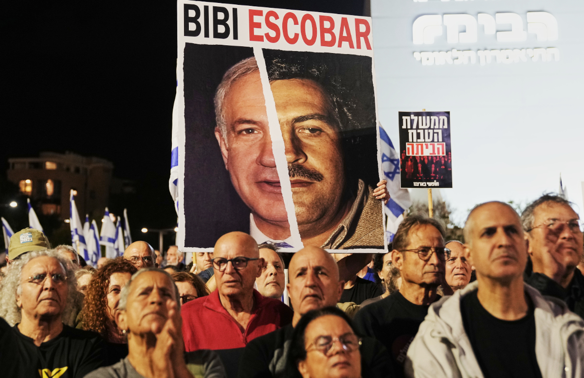 People take part in a protest against Prime Minister Benjamin Netanyahu's government and call for a state commission of inquiry to investigate the events of the Hamas militant group attack of October 7, 2023, as they gather at Habima square, in Tel Aviv, Israel, Saturday, Nov. 15, 2025. (AP)
