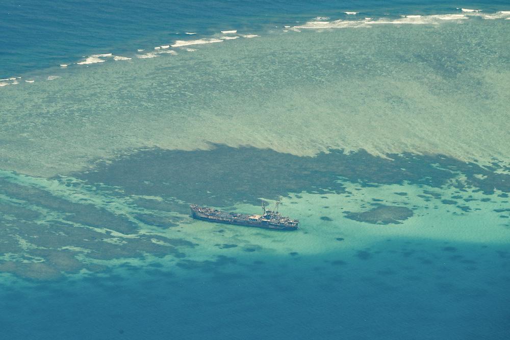 Above, an aerial view taken on March 9, 2023 shows Philippine ship BRP Sierra Madre grounded on Second Thomas Shoal in the South China Sea. (AFP file photo)