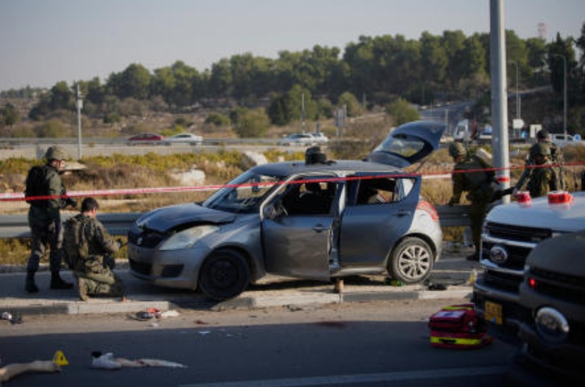 Members of Israeli security forces inspect the site of a ramming and stabbing attack near the West Bank Jewish settlement of Gush Etzion, Nov. 18, 2025. (AP)