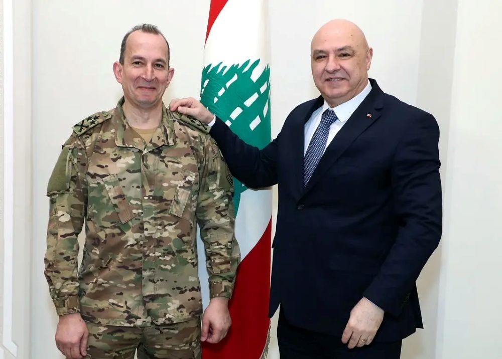 Lebanese President Joseph Aoun congratulates newly appointed Army Commander in Chief Rodolphe Haykal, at the presidential palace in Baabda, east of Beirut, Lebanon, Mar. 13, 2025. (AFP)