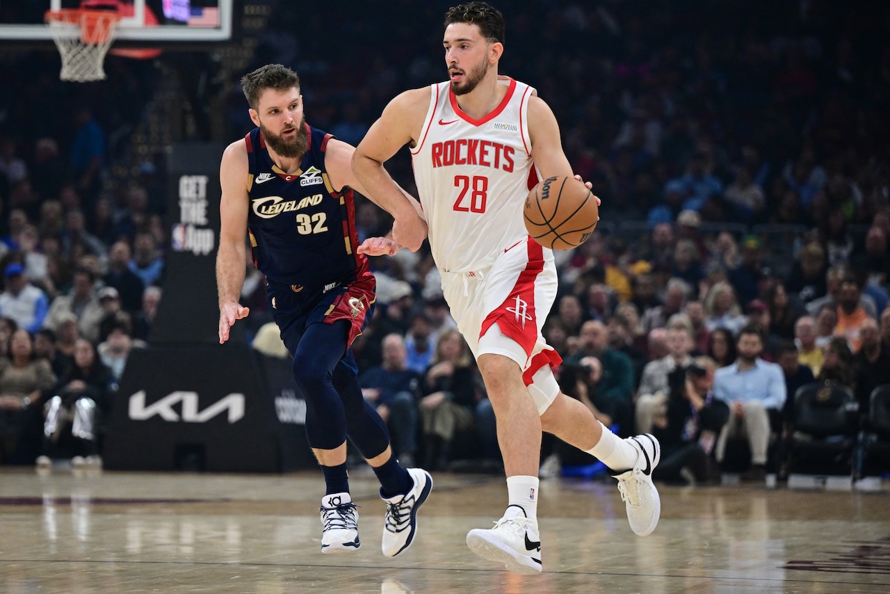 Houston Rockets center Alperen Sengun (28) dribbles ahead of Cleveland Cavaliers forward Dean Wade during the first half of an NBA game at Rocket Arena Wednesday. (Supplied)