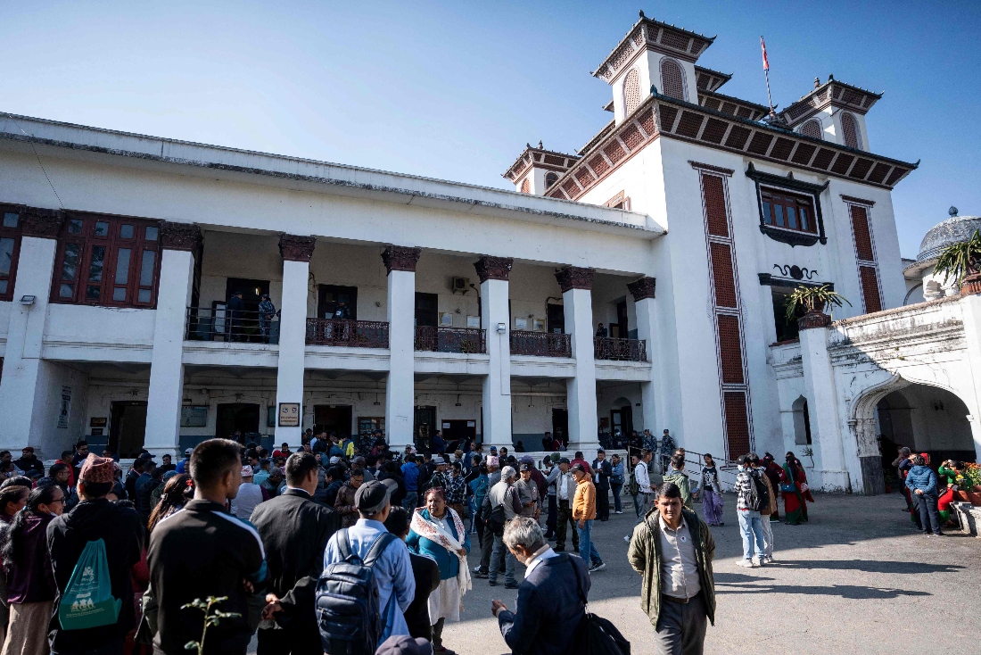 Supporters and representatives of various political groups gathering outside the Election Commission office in Kathmandu. (AFP)